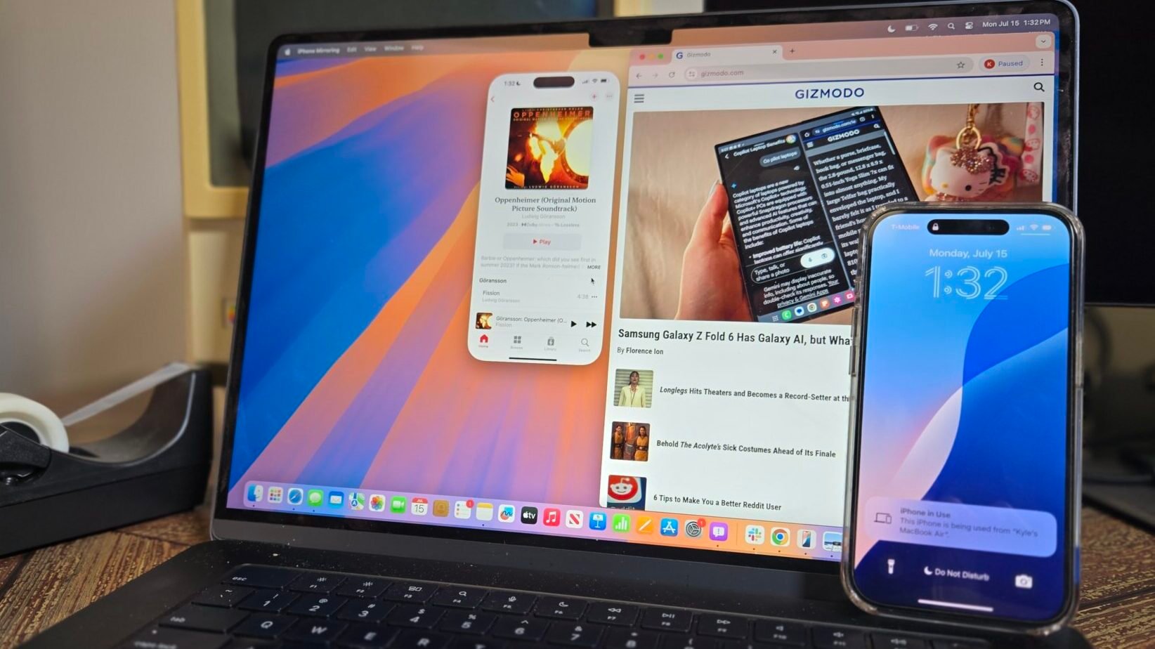 A MacBook Air with macOS Sequoia with iPhone 14