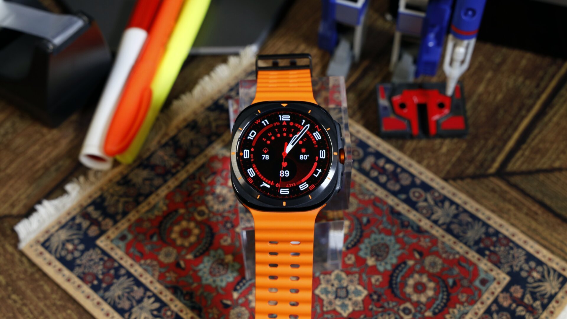 The Samsung Galaxy Watch Ultra with organge Marine watchband