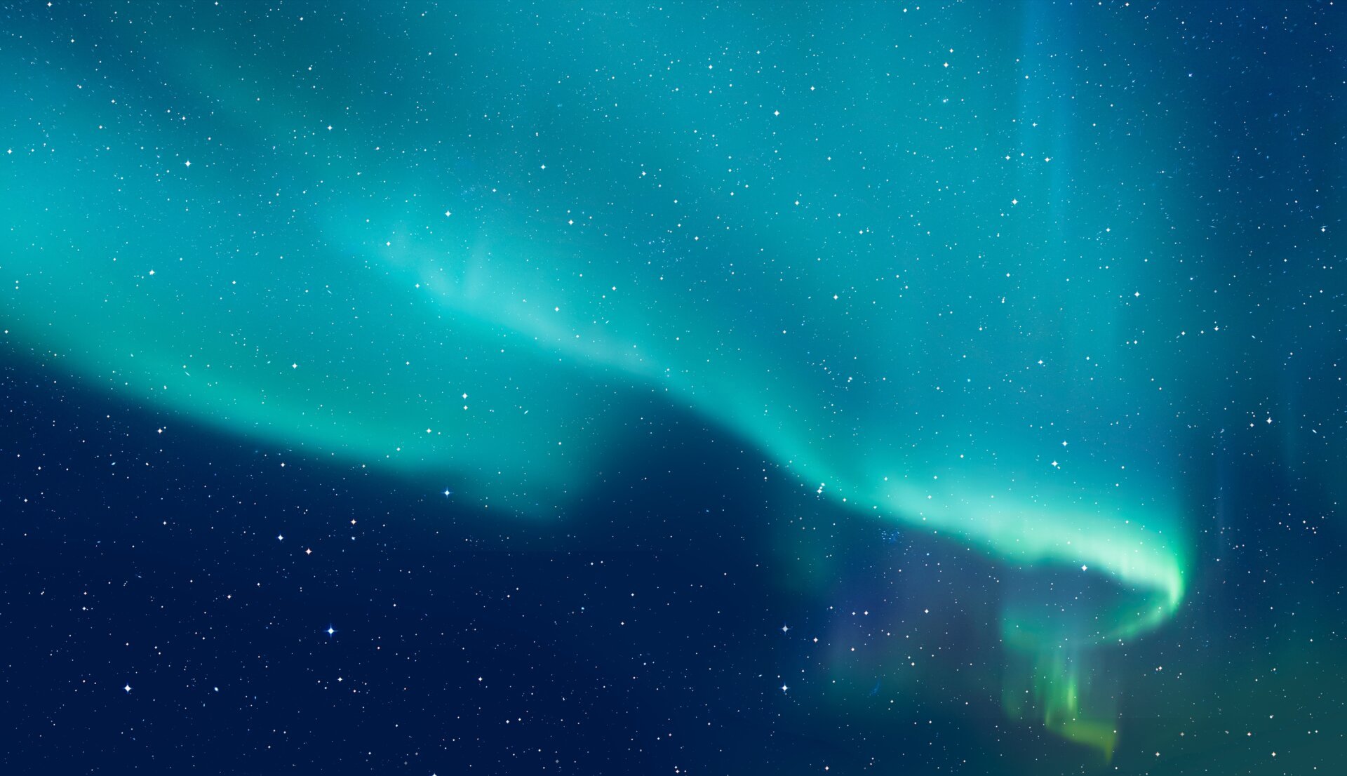 A picture of the Northern Lights in the night sky.