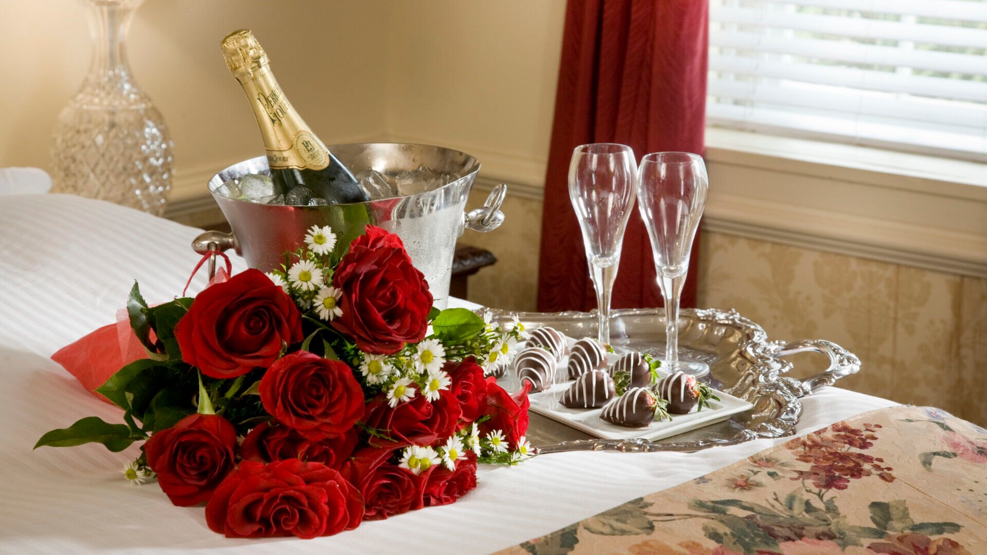 A romantic display of flowers, champagne and chocolate for hotel guests.