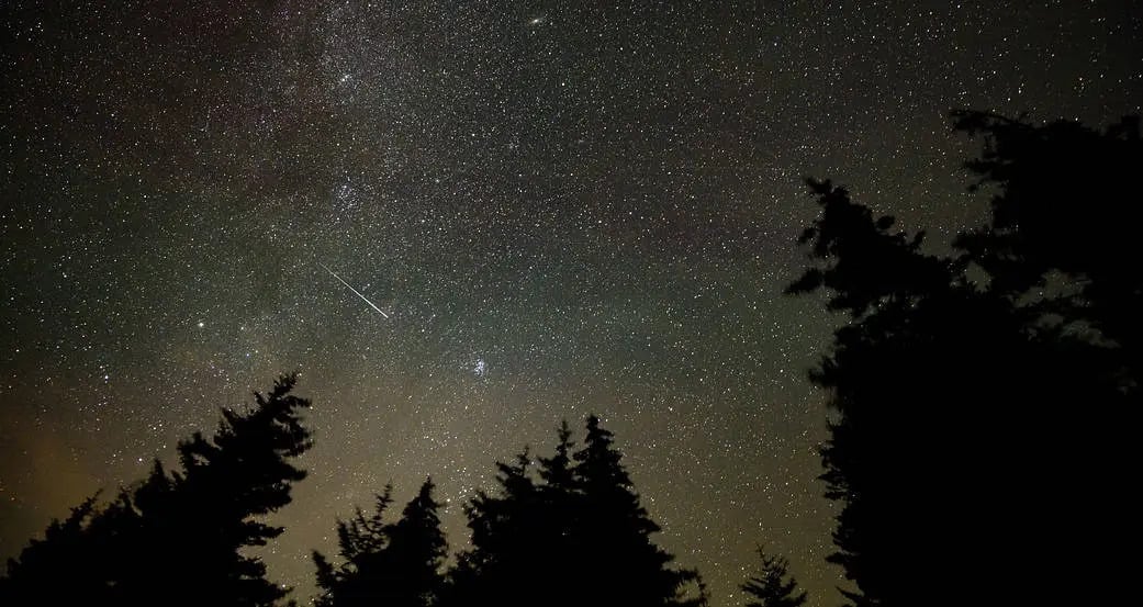 An image of a meteor cross the sky during the Perseid shower.